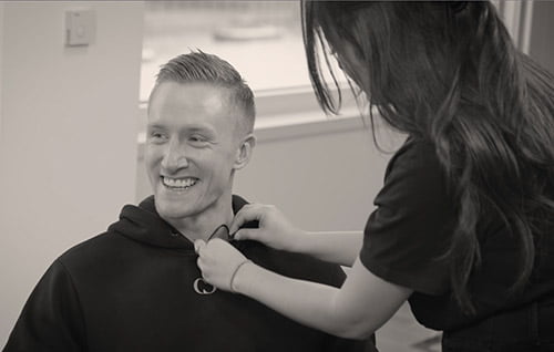 Reev getting mic attached.