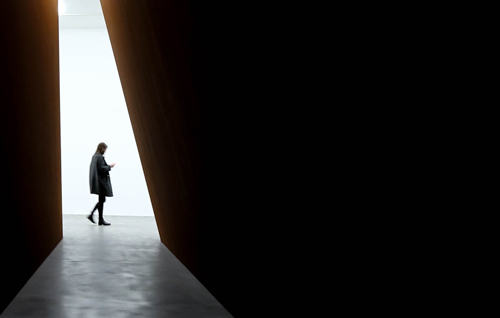 Businessman down dark alley