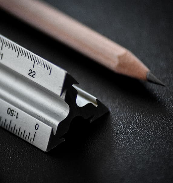 Ruler and pencil laying side by side