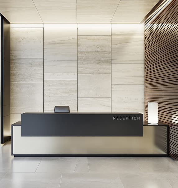 A hotel lobby reception desk. 