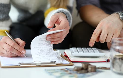 Calculating bills.