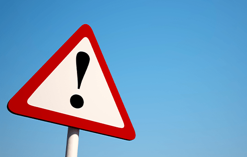 A warning road sign.