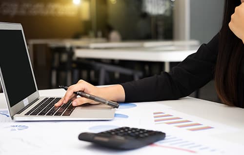 Person working on laptop.