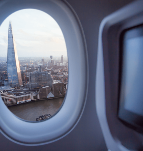 Plane window over London.